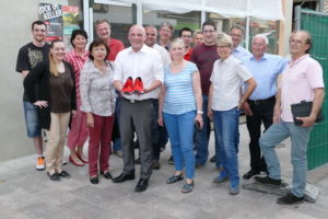 PM Daniel Born rote Laufschuhe